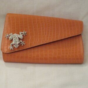 Lizard Clutch Bag in an Orange Tan Color by Pink Moon New York